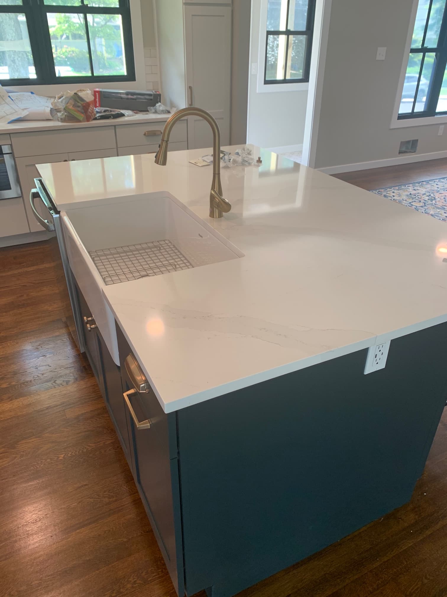 Navy blue shaker kitchen with light countertops, photo 1