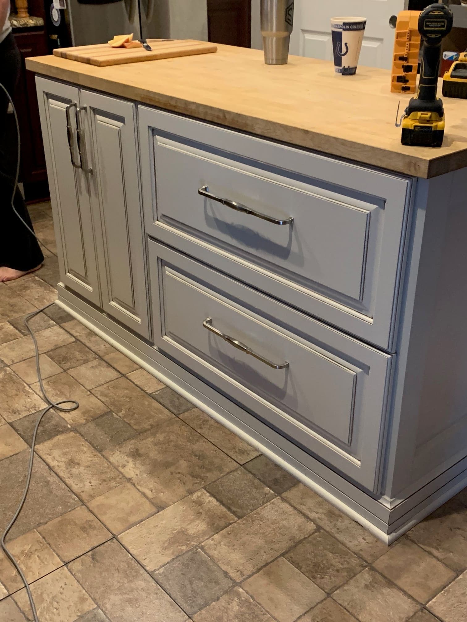 Gray raised panel kitchen with stone countertops, photo 1