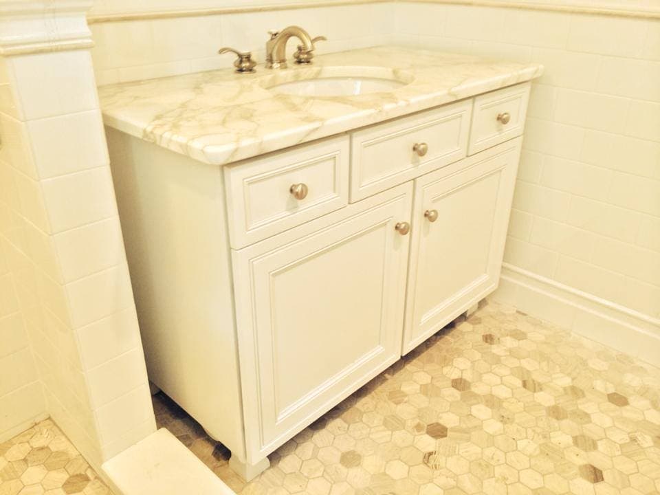 White shaker bathroom vanity with stone top, photo 1